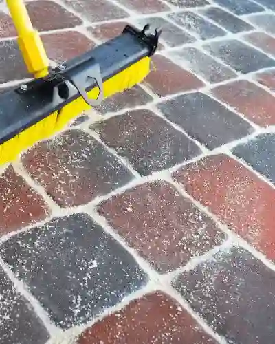 Paver-Sand-Filling-400x500 Filling in pavers with sand