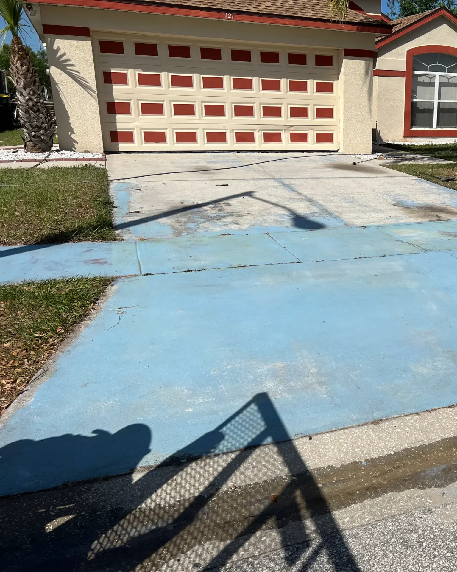 Before Driveway Paint Remover scaled e1773178560854